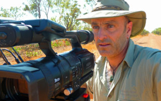 Dave Abbott filming in the Outback Australia